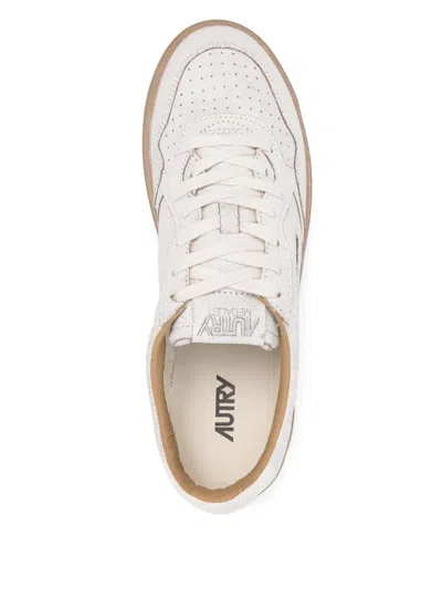Autry Low Top Leather Sneakers With Perforated Round Toe