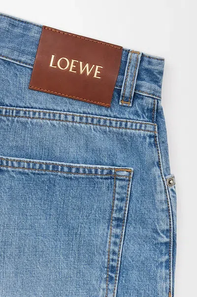 Loewe Anagram Frayed Denim Shorts In Blue