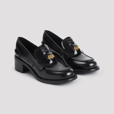 Miu Miu Penny Loafers In Brushed Leather In Black