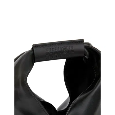 Mm6 Maison Margiela Mm6 By Maison Margiela Asymmetrical Black Mini Bag With Distinctive Handle In Black