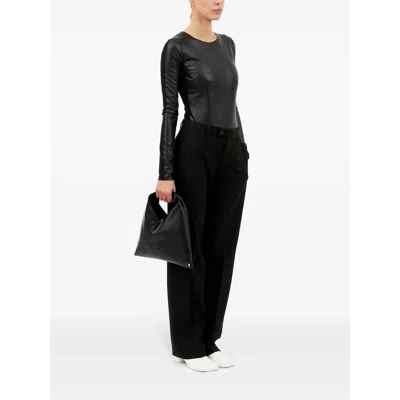 Mm6 Maison Margiela Mm6 By Maison Margiela Asymmetrical Black Mini Bag With Distinctive Handle In Black