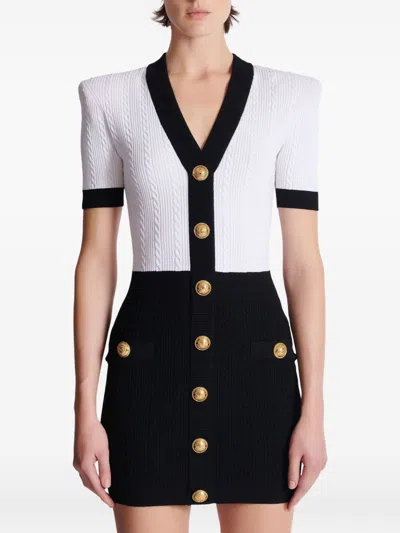Balmain Fitted Black Dress With Ribbed Texture And Gold Accents
