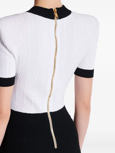 Balmain Fitted Black Dress With Ribbed Texture And Gold Accents