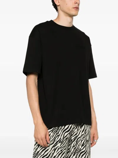 Amiri Tonal Logo Oversized Cotton T-shirt In Black