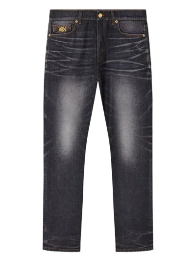 Versace Denim Jeans With Faded Effect And Contrast Stitching In Black