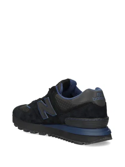 New Balance 574 Sneakers With Round Toe And Mesh Panels In Black