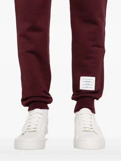 Thom Browne Four-stripes Cotton Track Pants In Red