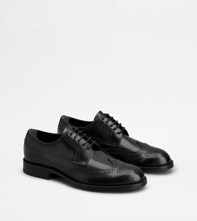 Tod's Classic Leather Brogue Shoes With Polished Finish In Animal Print