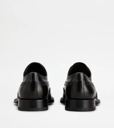 Tod's Classic Leather Brogue Shoes With Polished Finish In Animal Print