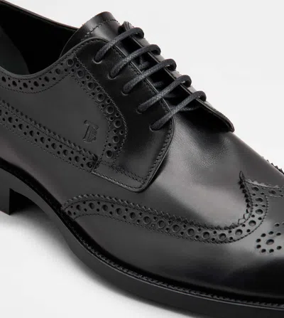 Tod's Classic Leather Brogue Shoes With Polished Finish In Animal Print