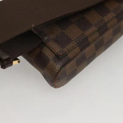 Pre-owned Louis Vuitton Geronimos Brown Canvas Clutch Bag ()