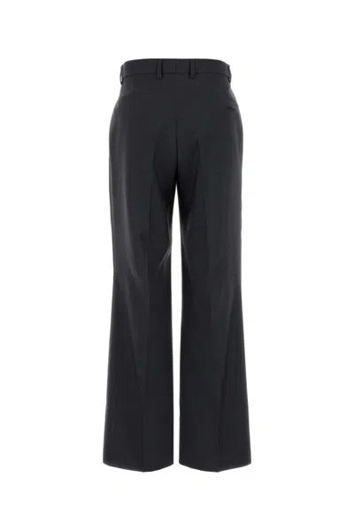 Gucci Wool Pant With Front Pleats And Side Slits In Black