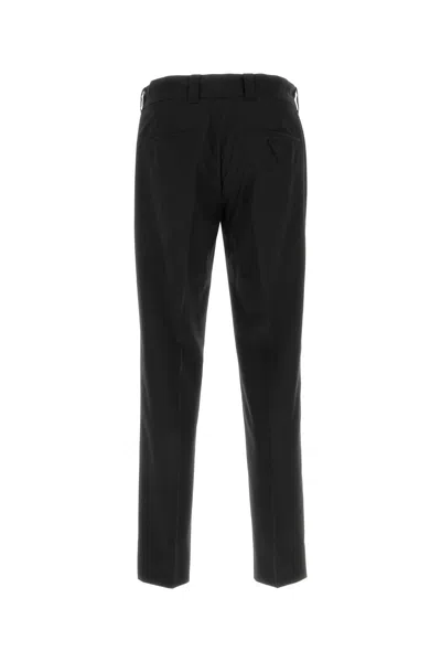 Prada Stretch Recycled Polyester Trousers In Black