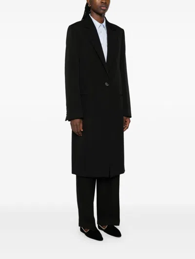 Totême Tailored Single-breasted Coat With Notched Lapels In Black