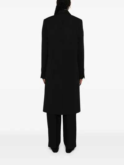 Totême Tailored Single-breasted Coat With Notched Lapels In Black