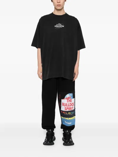 Vetements Graphic-print Trousers In Black