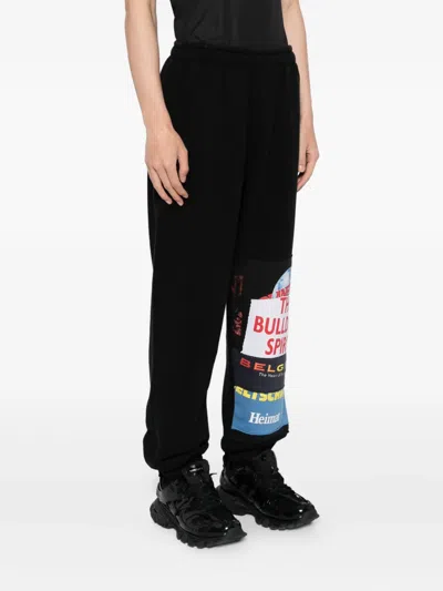 Vetements Graphic-print Trousers In Black