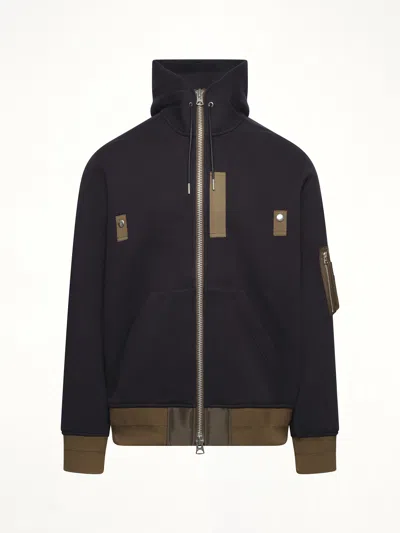 Sacai Hooded Knitwear With Ribbed Hem In Blue