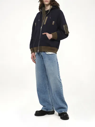 Sacai Hooded Knitwear With Ribbed Hem In Blue