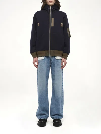 Sacai Hooded Knitwear With Ribbed Hem In Blue