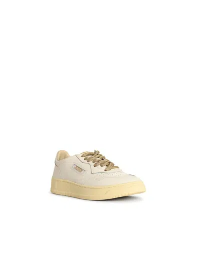 Autry 'medalist Low' White And Gold Leather Sneakers
