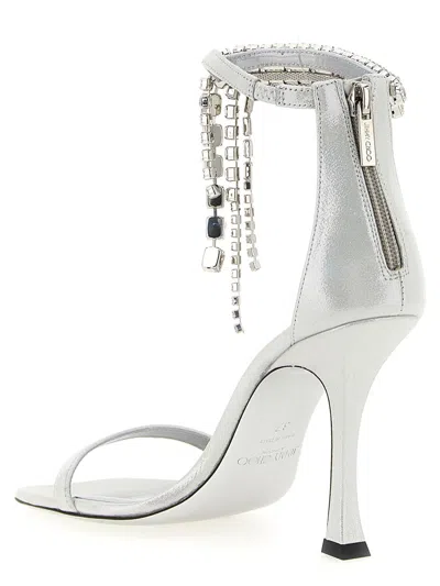 Jimmy Choo 'crystal' Metallic Sandals With Rhinestoned Ankle Strap And High Curved Heel