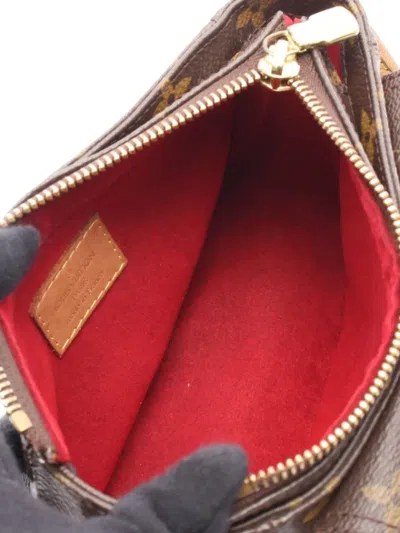Pre-owned Louis Vuitton 2009 Viva Cite Pm Shoulder Bag In Brown