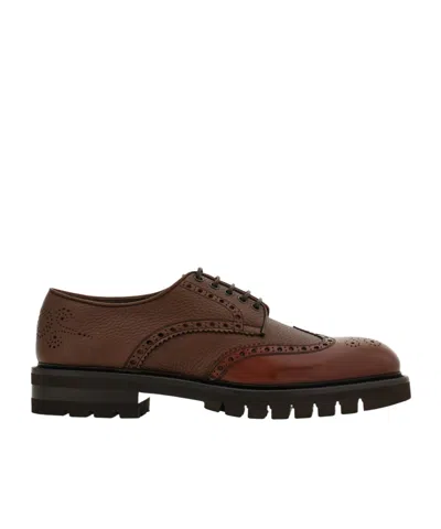 Ferragamo Brogue Wingtip Derby Shoes In Brown