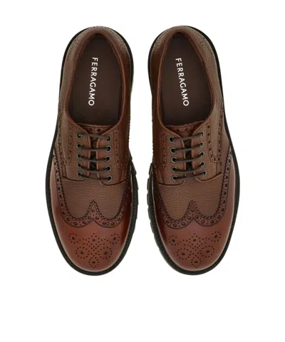 Ferragamo Brogue Wingtip Derby Shoes In Brown