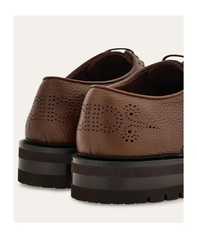 Ferragamo Brogue Wingtip Derby Shoes In Brown