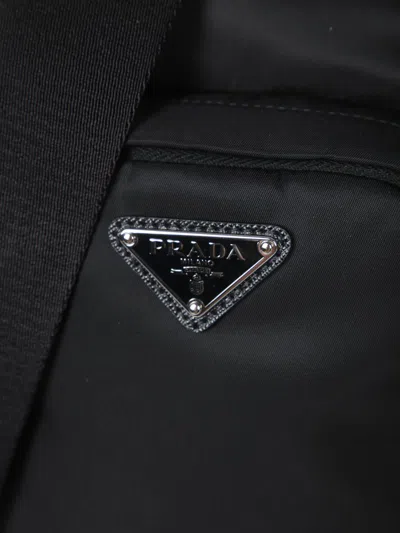 Prada Logo Re-nylon And Saffiano Leather Backpack In Black