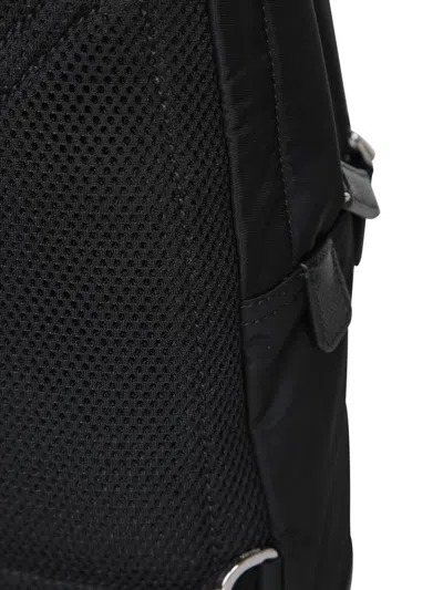 Prada Logo Re-nylon And Saffiano Leather Backpack In Black