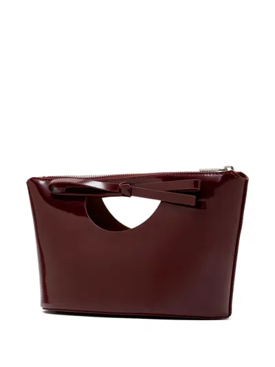 Studio Amelia Bow-detail Cut-out Clutch Bag