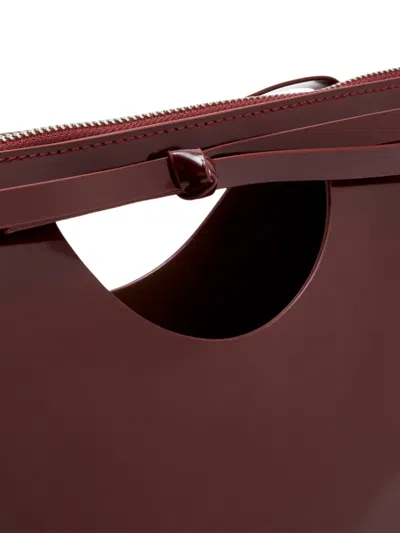 Studio Amelia Bow-detail Cut-out Clutch Bag