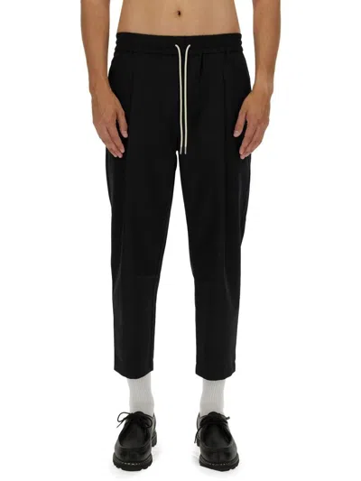 Drôle De Monsieur Black Carrot Pants With Drawstring In Wool Blend Man In Black