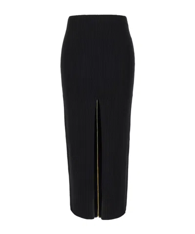Patou Wool Skirt With Front Slit And Ribbed Texture In Black