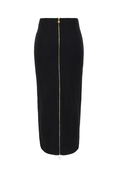 Patou Wool Skirt With Front Slit And Ribbed Texture In Black