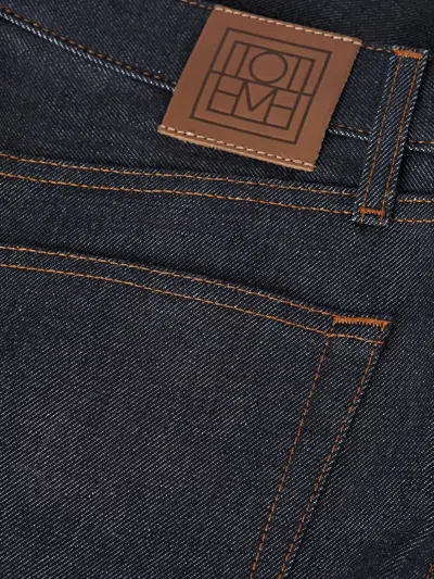 Totême Cotton Raw-denim Jeans In Black