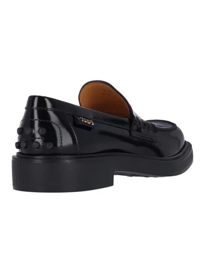 Tod's Black Calfskin Slip-on Loafers With Cut-out Detail