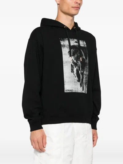 Versace Statue-print Cotton Hoodie In Black