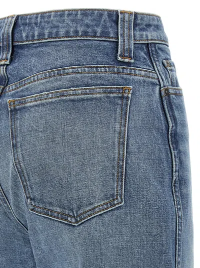 Khaite Sowen Rigid Mid-rise Wide-leg Jeans In Blue