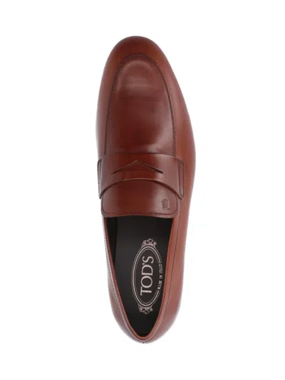 Tod's Pointed Toe Slip-on Shoes With Cut-out Detail