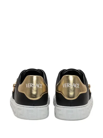 Versace Black Low Top Sneakers With Contrasting Heel With Logo Lettering And Medusa Plaque In Tech Fabric Ma