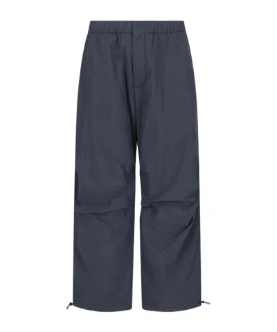 Studio Nicholson Straight Trousers With Elastic Waistband And Drawstring Hem In Blue