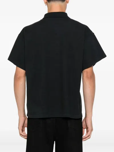 The Row Short-sleeve Buttoned Polo Shirt In Black