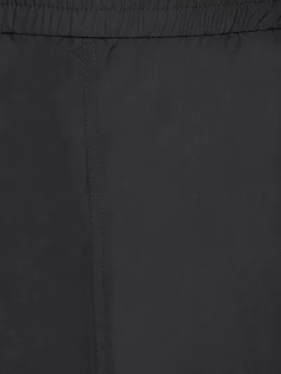 Givenchy Nylon Shorts With Elastic Waistband And Functional Pockets In Black