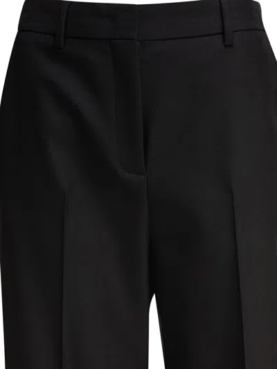 Valentino Garavani Trousers In Black