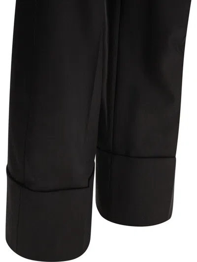 Valentino Garavani Trousers In Black