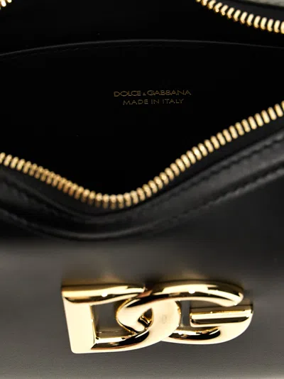 Dolce & Gabbana Curved Black Bag With Gold Logo Accents In Black