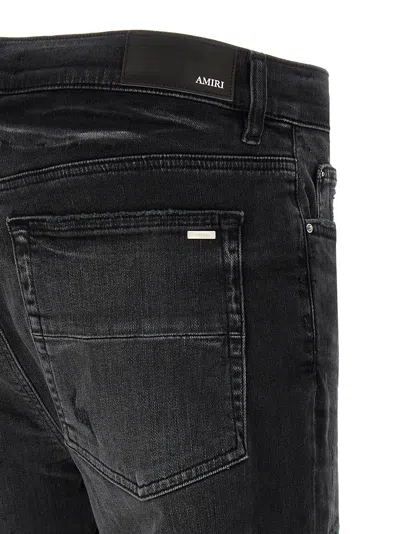 Amiri Hollywood Repaired Jean Distressed Skinny Jeans In Black